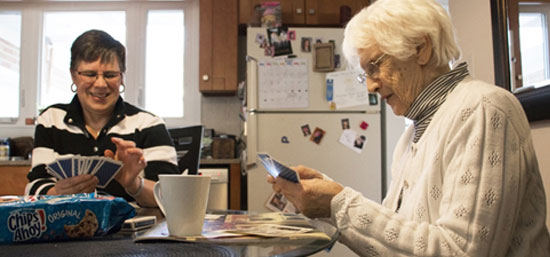 Photo of a volunteer and a Senior