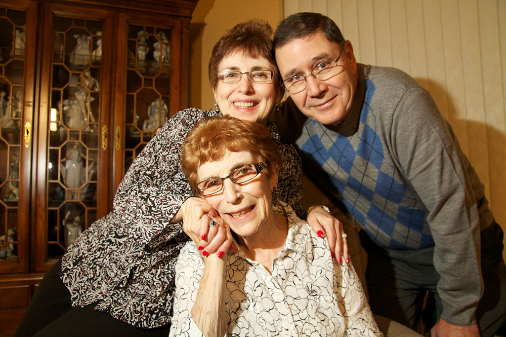 Photo of a happy Senior with volunteers